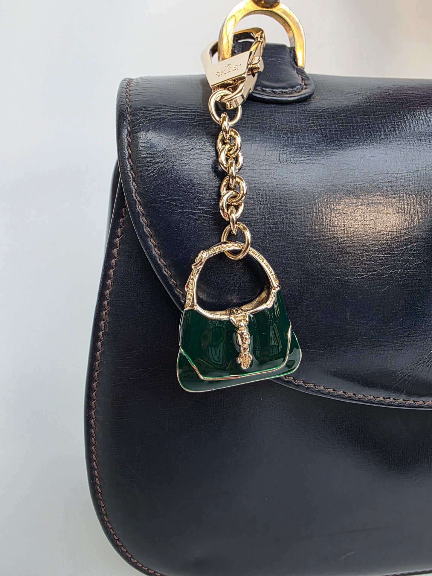 Portachiavi Gucci "Jackie Bag" in metallo smaltato