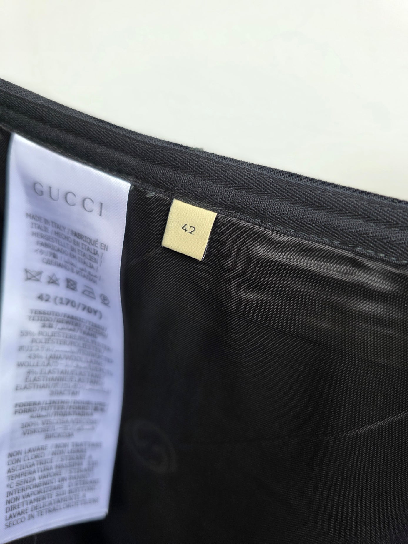 Gonna midi Gucci con morsetti laterali FW 2023