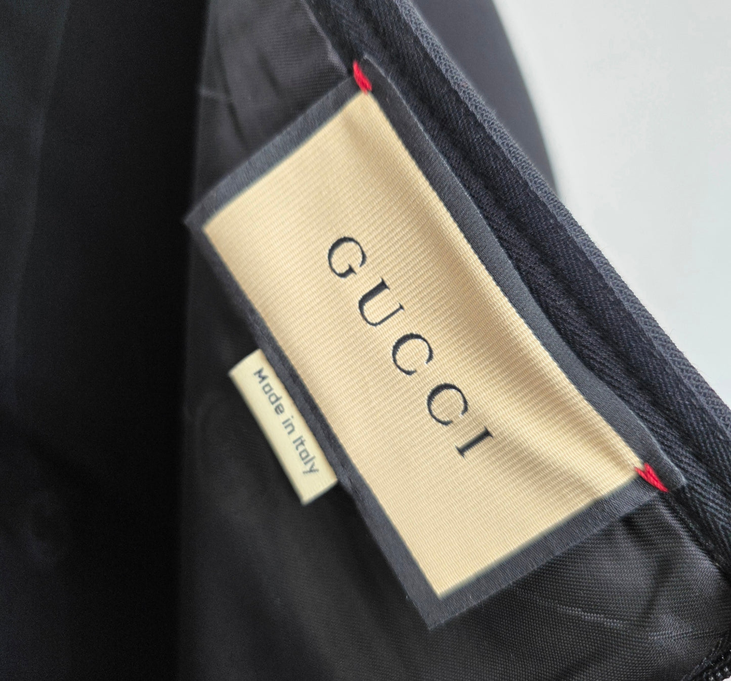 Gonna midi Gucci con morsetti laterali FW 2023