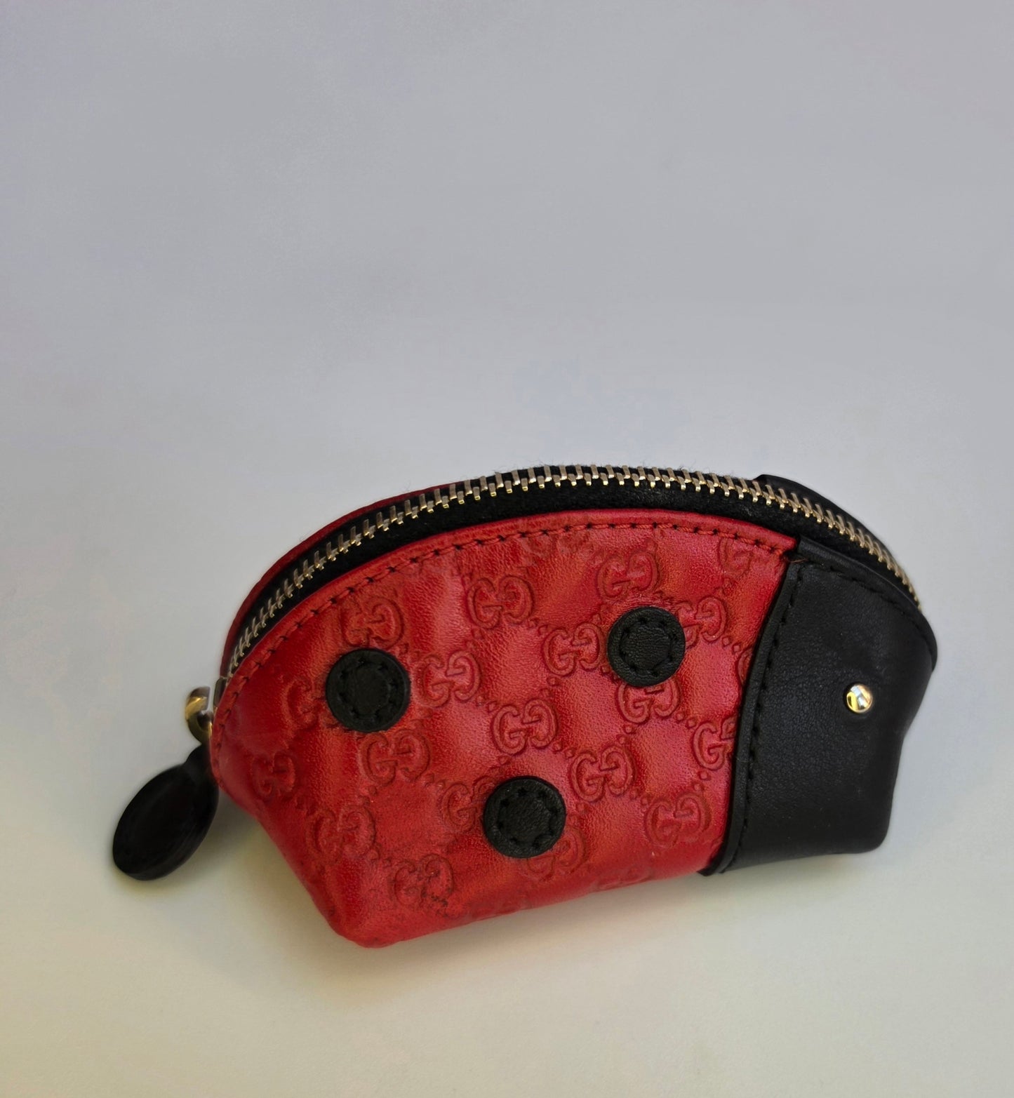 Portamonete Gucci coccinella in pelle microguccissima