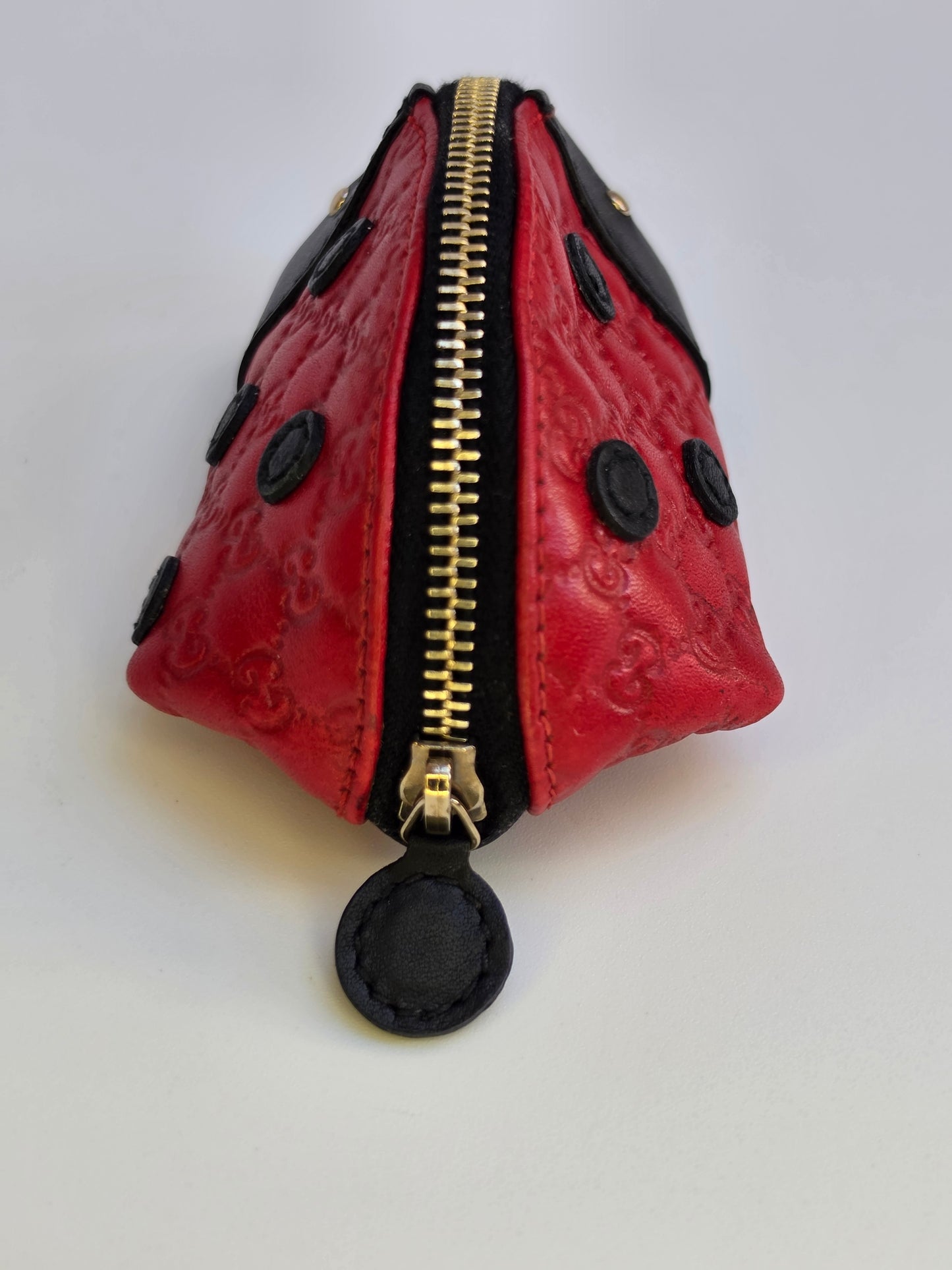 Portamonete Gucci coccinella in pelle microguccissima