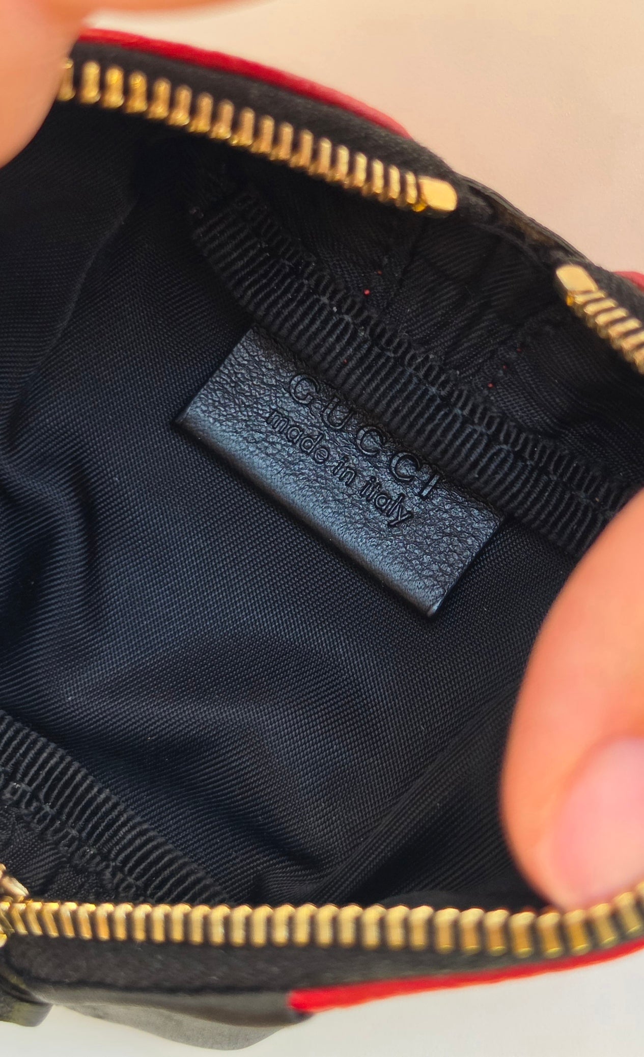 Portamonete Gucci coccinella in pelle microguccissima