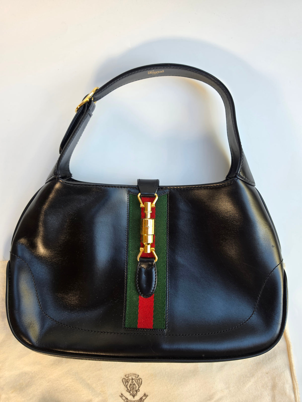 Vintage Gucci Jackie bag in black leather with green-red-green web stripe, 1970s