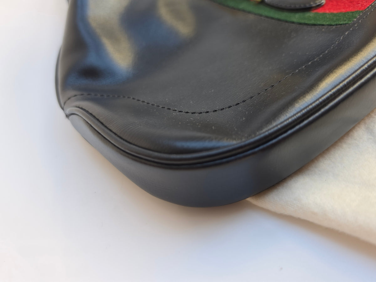 Vintage Gucci Jackie bag in black leather with green-red-green web stripe, 1970s