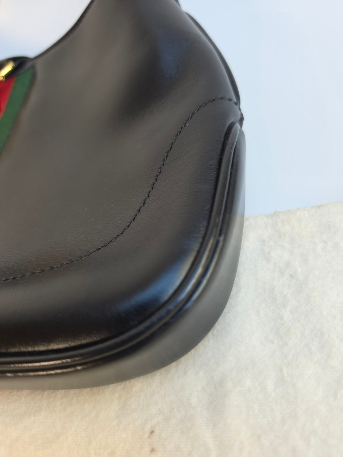 Vintage Gucci Jackie bag in black leather with green-red-green web stripe, 1970s