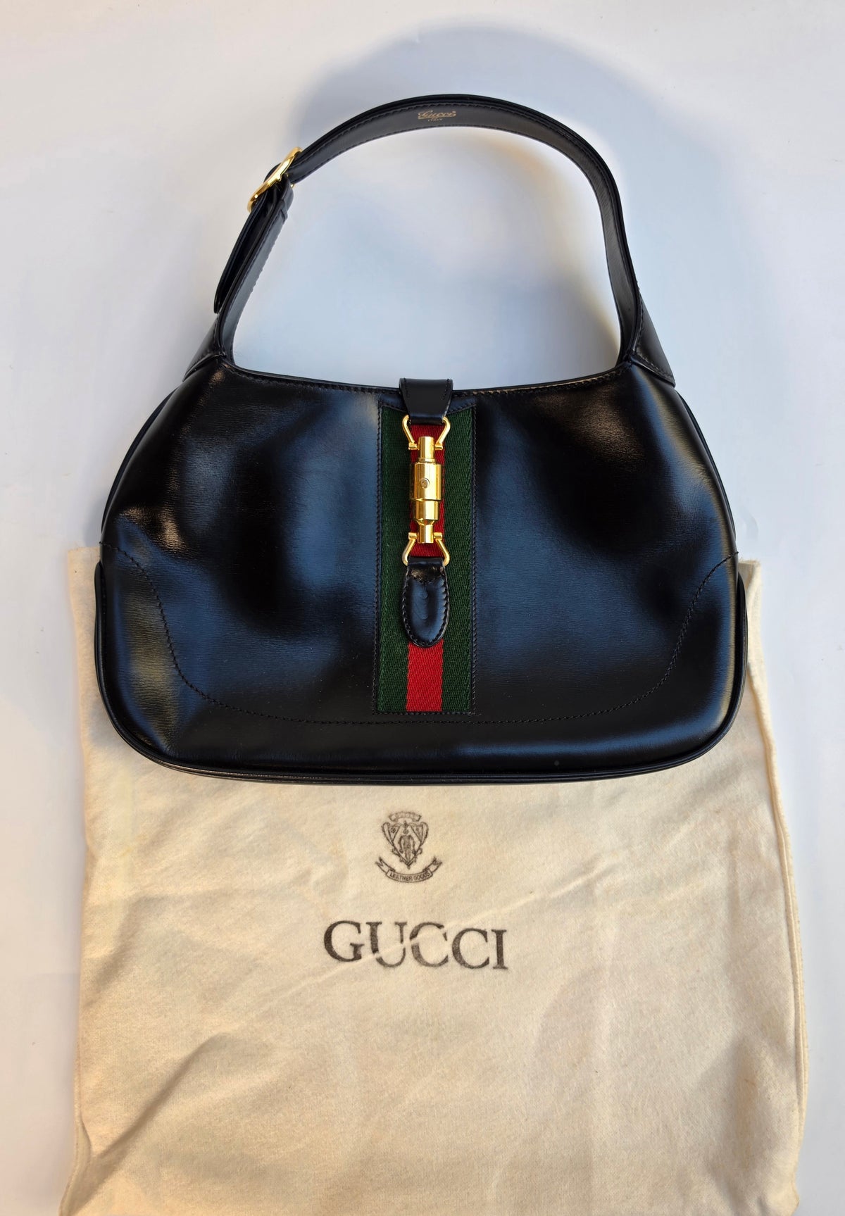 Vintage Gucci Jackie bag in black leather with green-red-green web stripe, 1970s