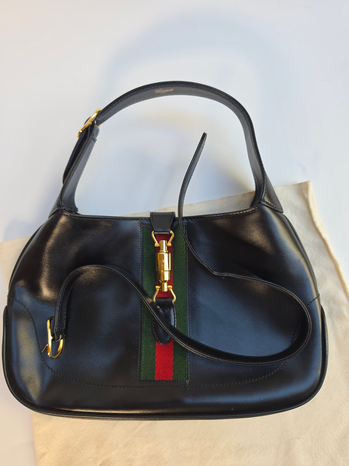 Vintage Gucci Jackie bag in black leather with green-red-green web stripe, 1970s