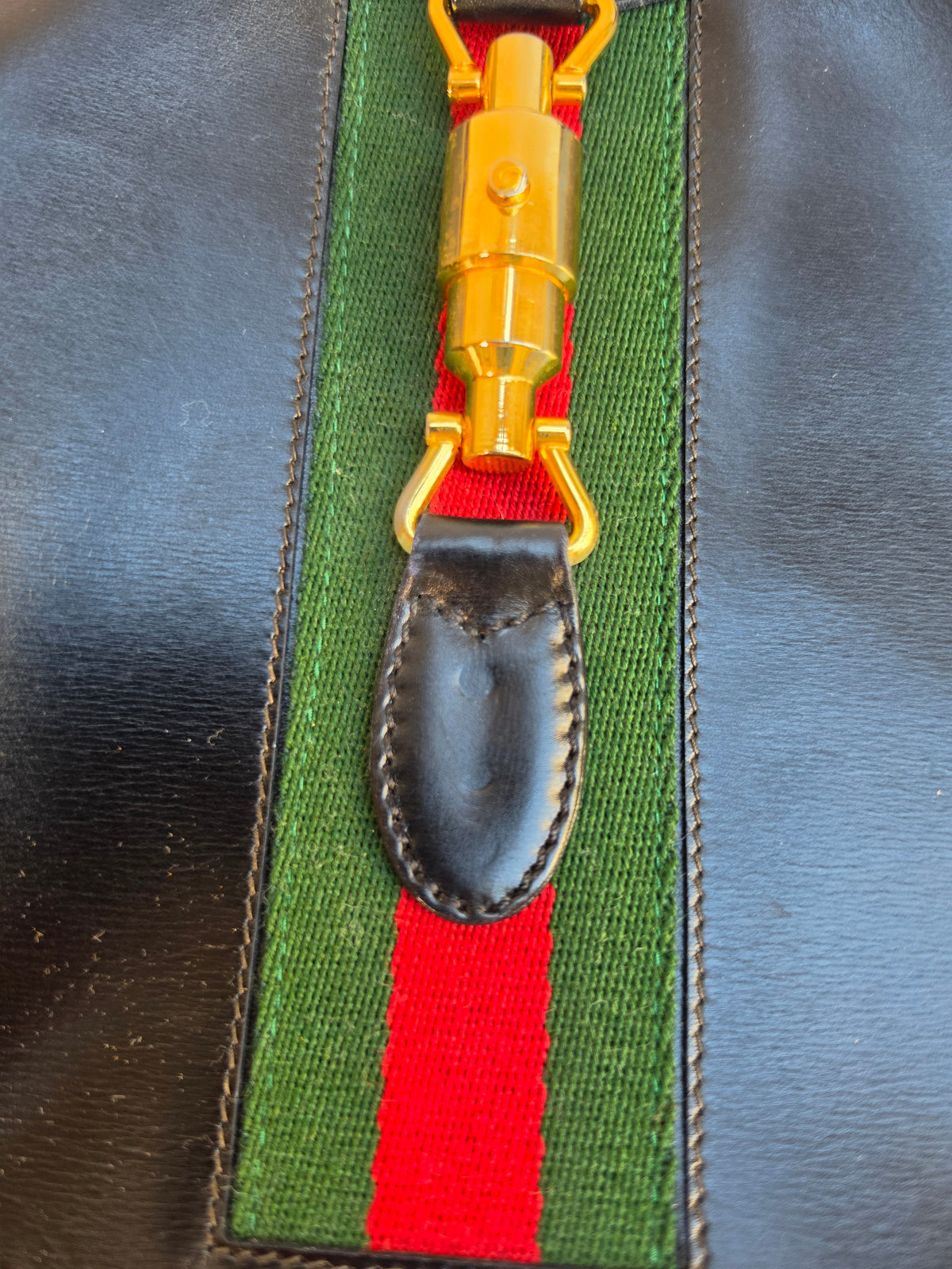 Vintage Gucci Jackie bag in black leather with green-red-green web stripe, 1970s