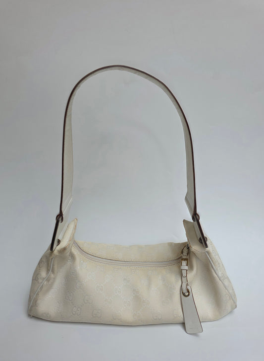 Borsa Gucci vintage modello baguette in tela GG monogram bianca, anni '90
