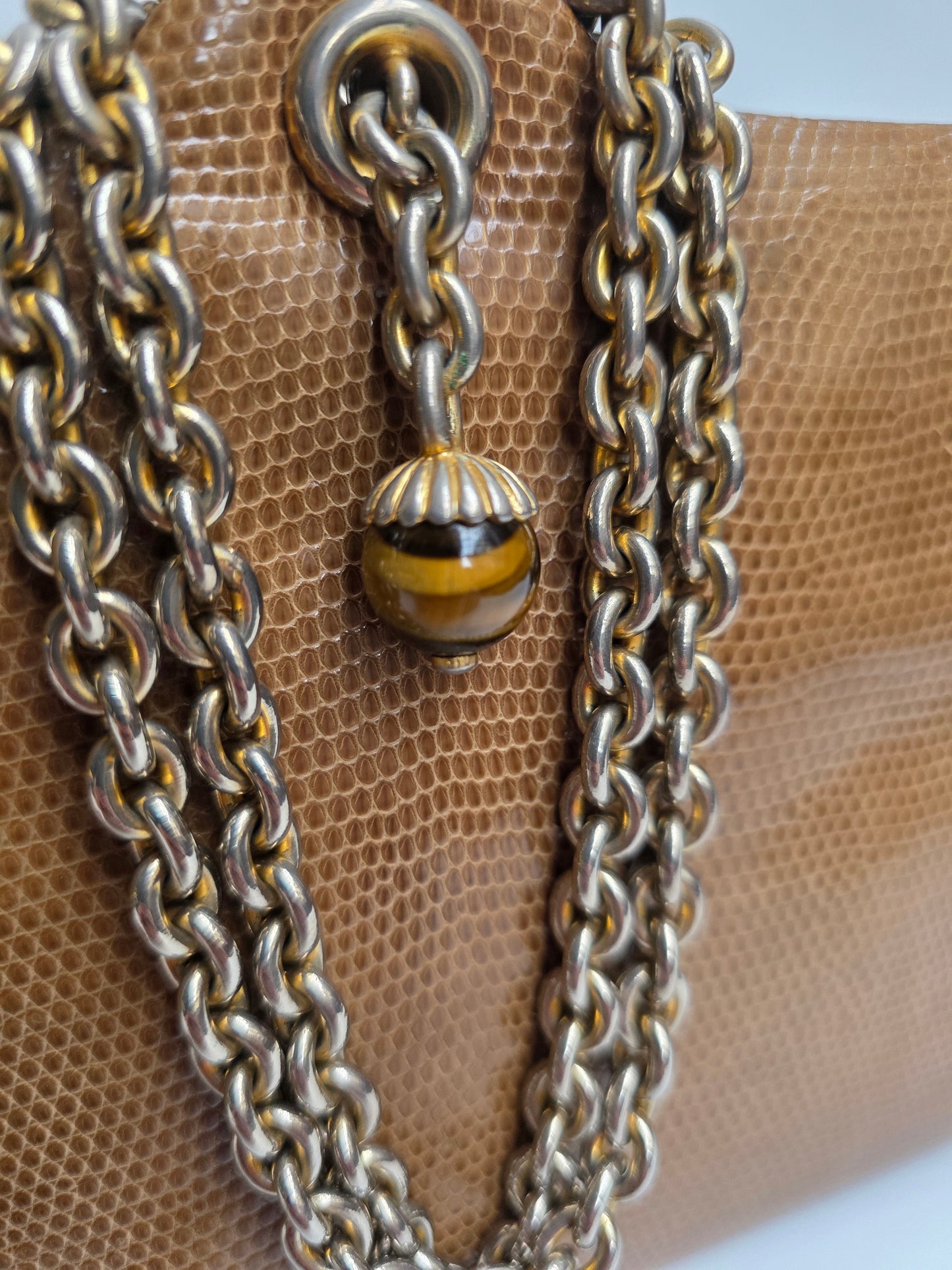 Borsa da sera Gucci vintage in pelle di lucertola con dettaglio Occhio di Tigre, anni '60
